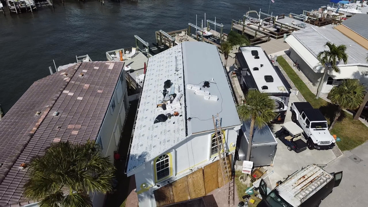 Waterfront flat roof underlayment installation by Rooftop Roofing